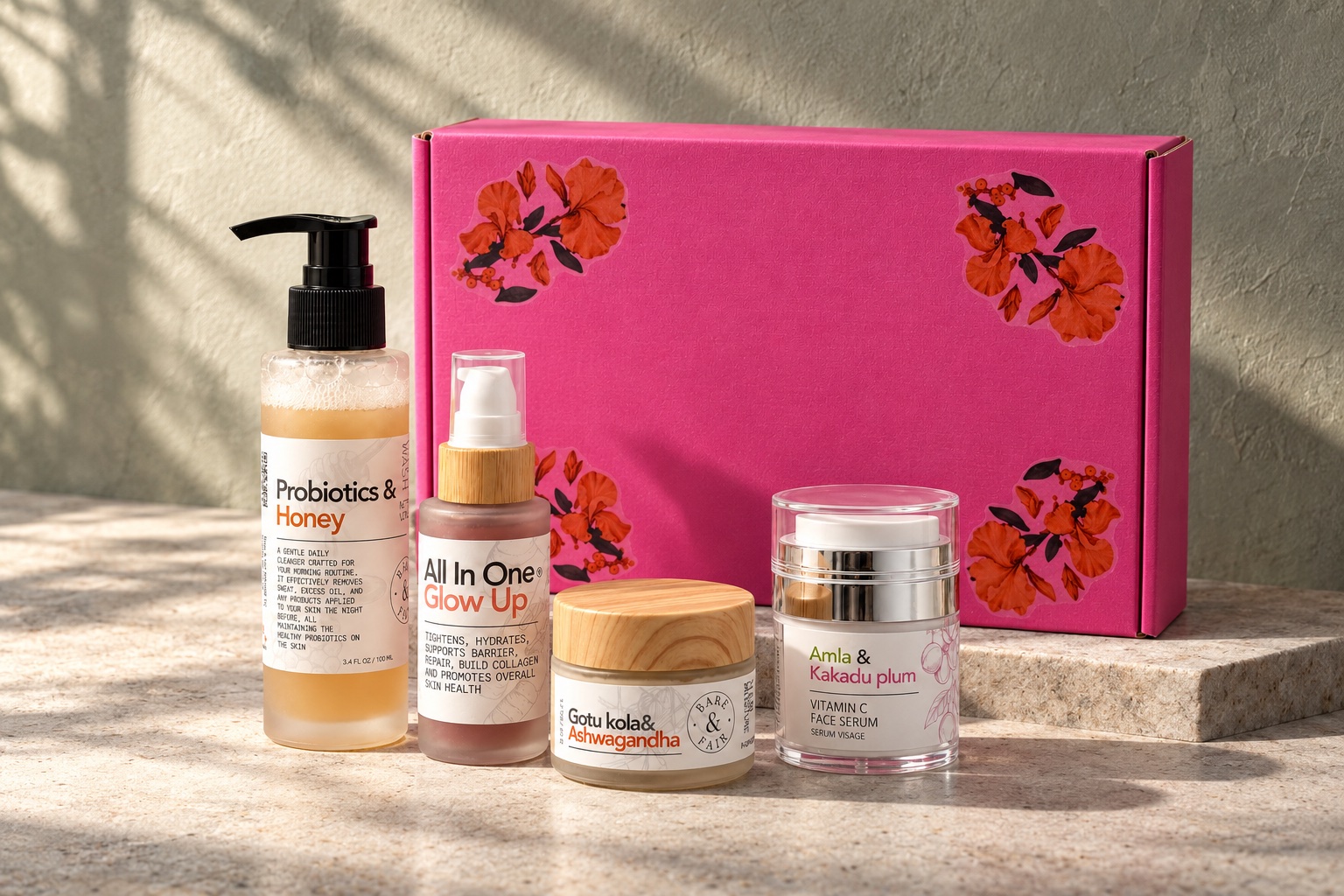 Bare & Fair skincare formulations arranged beside our pink floral gift box